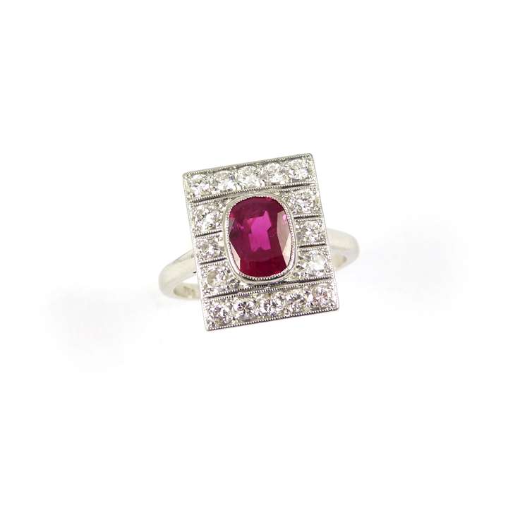 Art Deco single stone ruby and diamond panel ring, centred by a cushion cut Burma ruby, 1.50ct